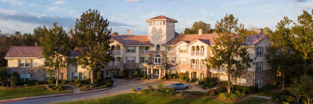 Neighbors enjoying a walk in a 55+ retirement community